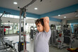 © CANDID =X=/Stocksy - Young Boy Stretching in the Gym