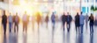 © Ilja - Blurred People Walking in a Modern Office Building, Abstract Business and Commuter Background