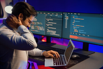it developer being tried of overwork on solve problem in error software coding system with sitting t