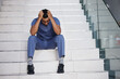 © peopleimages.com - Sad, doctor and shout with stress at hospital for medical mistake, depression and anxiety from healthcare burnout. Man, relax or scream on stairs with surgery news, mental health and emergency crisis