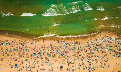 Wall Mural - Crowded beach in Poland in summer, Baltic Sea, aerial view