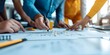 © Odin AI - Individuals collaborate by analyzing architectural blueprints, illustrating teamwork, precision, and the detailed work involved in modern architectural projects.