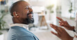 © peopleimages.com - Black man, happy and hearing aid with gratitude, medical support and care with implant for sound and audio. Deaf, back and check of patient with disability in hospital for technology and installation