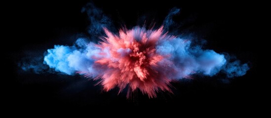 Red and blue powder explosion isolated on black background.