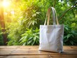 © DigitalArt Max - Minimalist White Canvas Bag on Wooden Table for Eco-Friendly Shopping and Cute Shopper Mockup