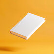 © LHG - 활기찬 노란색 배경에 미니멀리스트 화이트 북 모형
