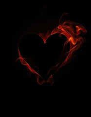 black heart silhouette surrounded by vibrant flames on a dark background.