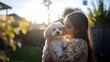 © Postmodern Studio - Joyful and Heartwarming Moments Woman Kissing Her Adorable Dog in a Beautiful Sunlit Garden Filled with Happiness and Love