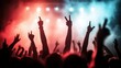 ©  Jovaduplex - A lively concert scene with silhouettes of an energetic crowd raising hands under vibrant, colorful lighting, capturing the essence of joy and celebration.