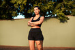 © peopleimages.com - Woman, workout and portrait with arms crossed at court for sports game, exercise and wellness. Serious, athlete and player with confidence in sunshine for competition, fitness and outdoor match