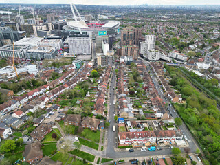 Wall Mural - Aerial View of Downtown and Central Wembley London City of England Great Britain. High Angle Footage Was Captured with Drone's Camera from Medium High Altitude on April 17th, 2024