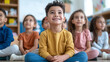 © Quality One   - Happy children sitting on floor in classroom, engaged and smiling. Their expressions reflect joy and curiosity, creating warm and inviting atmosphere