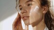 © Tracto - Model applying facial mist for a fresh look