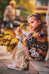 Wall Mural - Portrait of a child in autumn 