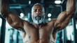 ©  Jovaduplex - A muscular man with a gray beard is intensely exercising at the gym, showcasing his strength and determination, under the ambient lighting of a modern fitness center.
