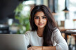 © Bojan - Focused Indian Businesswoman in Professional Portrait