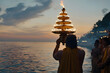 © A2Z AI  - A Sadhu performing the Ganga Aarti ceremony in India, surrounded by the sacred glow of lamps and the river’s flowing waters, embodying devotion, spirituality, and tradition
