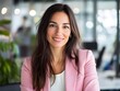 © bvbflo1 - Business woman wearing pink blazer with office background
