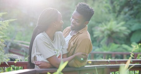 Wall Mural - Happy, garden and black couple with connection in nature for romance date on vacation or holiday. Smile, care and African man and woman with love, marriage and bonding outdoor in park on weekend trip