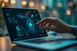 © PhotoArtHub - A hand reaches out to touch a laptop screen with a glowing interface