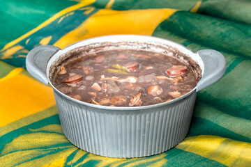 Wall Mural - Traditional Brazilian feijoada in a rustic pan