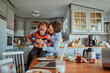 © Geber86 - Father and son having fun at kitchen table