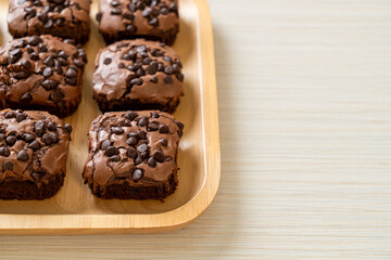 Wall Mural - dark chocolate brownies topped by chocolate chips