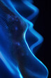 © Hunman - Vertical Technology Network Background with copyspace. Blie lines on black background.