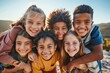 © Asier - Portrait of a group of smiling children looking at camera while standing outdoors