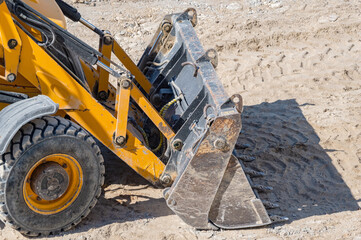 yellow excavator machines