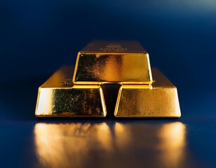 Stacked gold bars arranged in pyramid formation on reflective dark surface with deep blue background