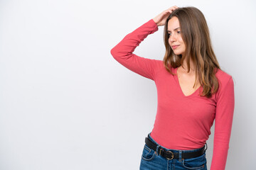 Wall Mural - Young caucasian woman isolated on white background having doubts while scratching head