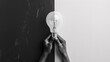 © mahamad - Black and White Light Bulb: Vertical collage of black and white images featuring an arm holding a light bulb, isolated on a painted white background.