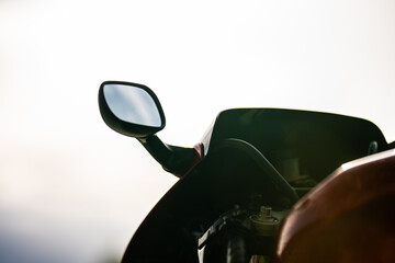 Wall Mural - Mirror of a red fast motorcycle.