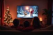© Milky Way - A family watches a Christmas movie featuring Santa and a reindeer under a snowy night sky, creating a cozy holiday atmosphere with a decorated Christmas tree and warm lights