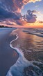 © vadosloginov - A breathtaking sunset over the Gulf Coast with gentle waves and colorful clouds reflecting on the shoreline