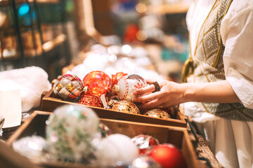 Asian woman choosing gift shop on Christmas and happy new year holidays