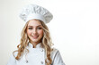 © luismolinero - Young pretty blonde woman over isolated white background in chef uniform