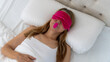 © Sevda Ercan - Woman using mouth tape to promote nasal breathing. Mouth Tape is used to help promote healthier breathing, improve sleep quality and reduce snoring