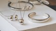 © Светлана Ефименко - silver jewelry on a white table