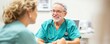 © Design@22 - Elderly patient talking about insurance with nurse, cozy clinic, compassionate care