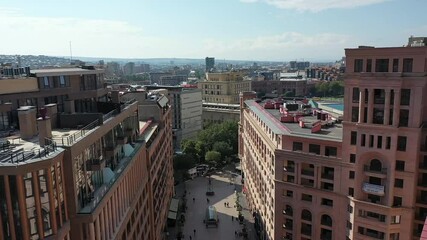 Wall Mural - The urban buildings of the Northern Avenue on a sunny day with a blue sky in Yerevan, Armenia