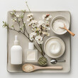 © Tatyana - Beauty products and natural elements on a minimalistic tray