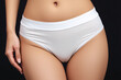 © Vladislav - Promotional photo featuring a mockup of white women’s briefs panties on a clean, minimalist background. Ideal for showcasing lingerie design, fabric texture