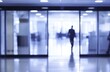 © rui - Blurry office space with a modern glass door
