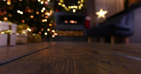 Wall Mural - christmas presents near the tree with a fireplace. home decorations on christmas eve