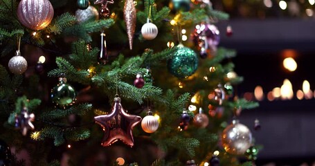 Wall Mural - christmas tree decorated with beautiful toys and gifts near the fireplace with fire