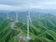 © Sergey - Wind turbines stand tall among lush green hills under a cloudy sky, showcasing a commitment to clean energy and sustainable practices.