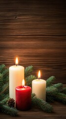 Wall Mural - candles are lit and surrounded by pine branches, creating a cozy Christmas atmosphere with two unlit candles nearby