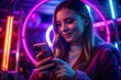 © Diana - Young woman enjoying her phone, surrounded by neon pink and blue lights, creating a vibrant urban nightlife atmosphere. Perfect for themes of modern technology and youth culture.